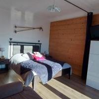 Chambre parentale avec accès à la terrasse