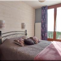 Chambre avec joli panorama sur la chaîne de montagne